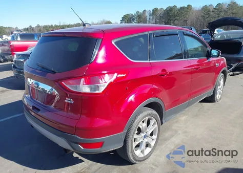 2013 Ford Escape Sel z USA, uszkodzony, nr VIN 1FMCU9H92DUA61112